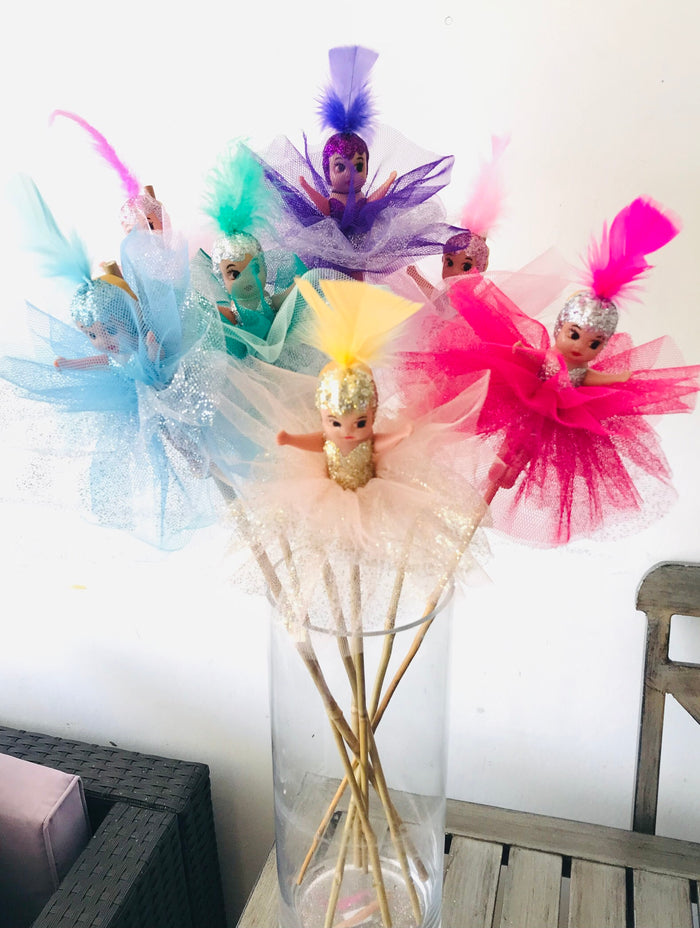 Mixed bunch of 6 bright coloured kewpies on a stick